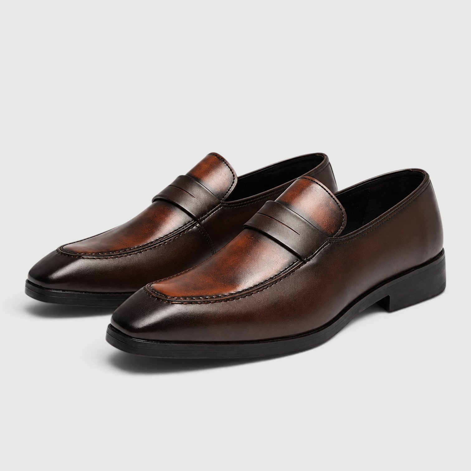 Men's Penny Loafers with smart casual slip-on design.