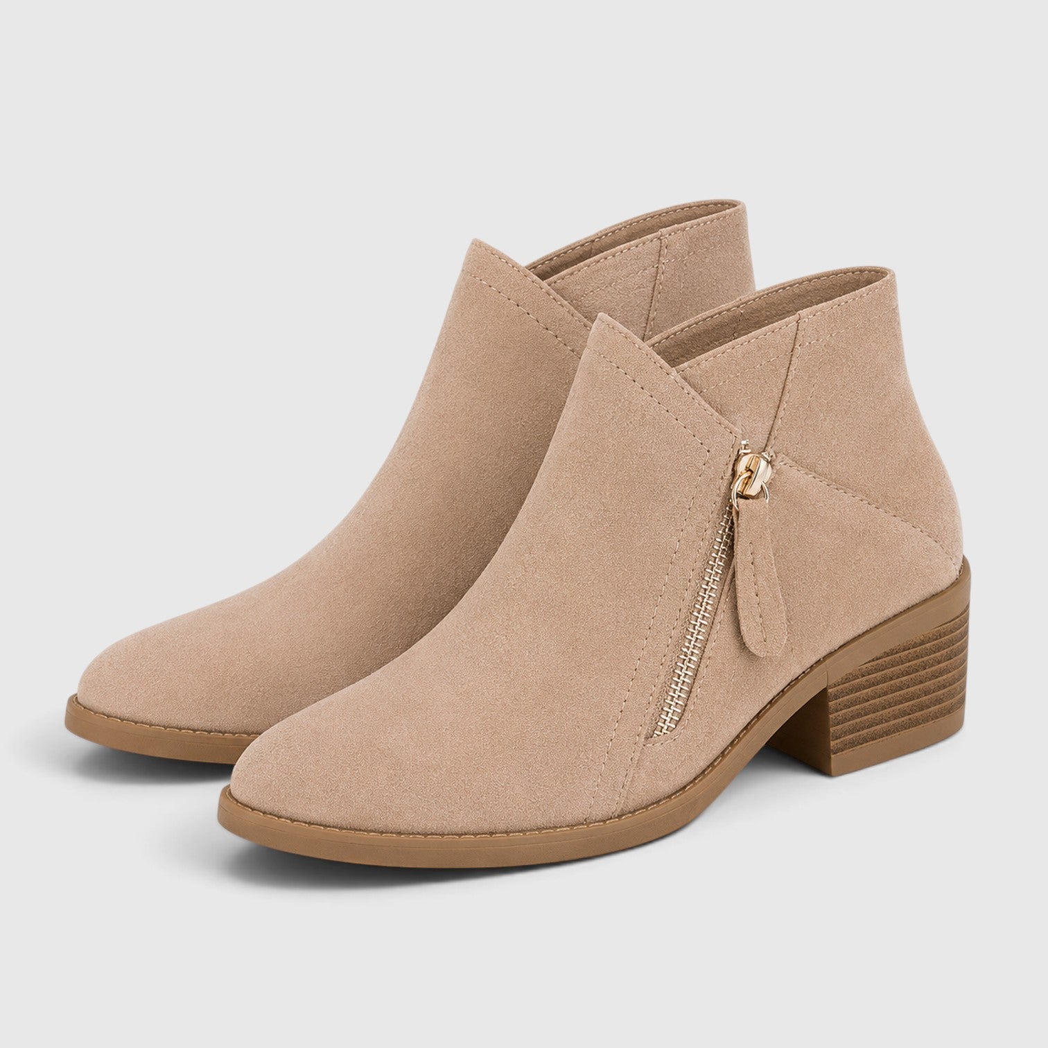 Women's Ankle Boots with side zip low heel design.