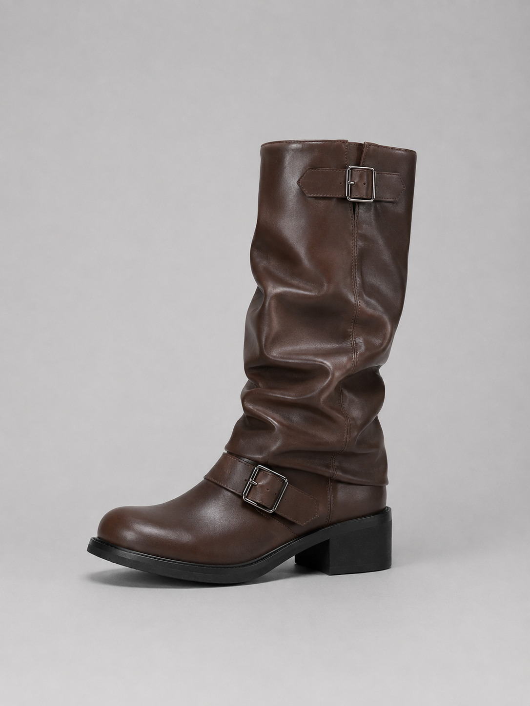 Women's Biker Boots with buckle detail low heel design.