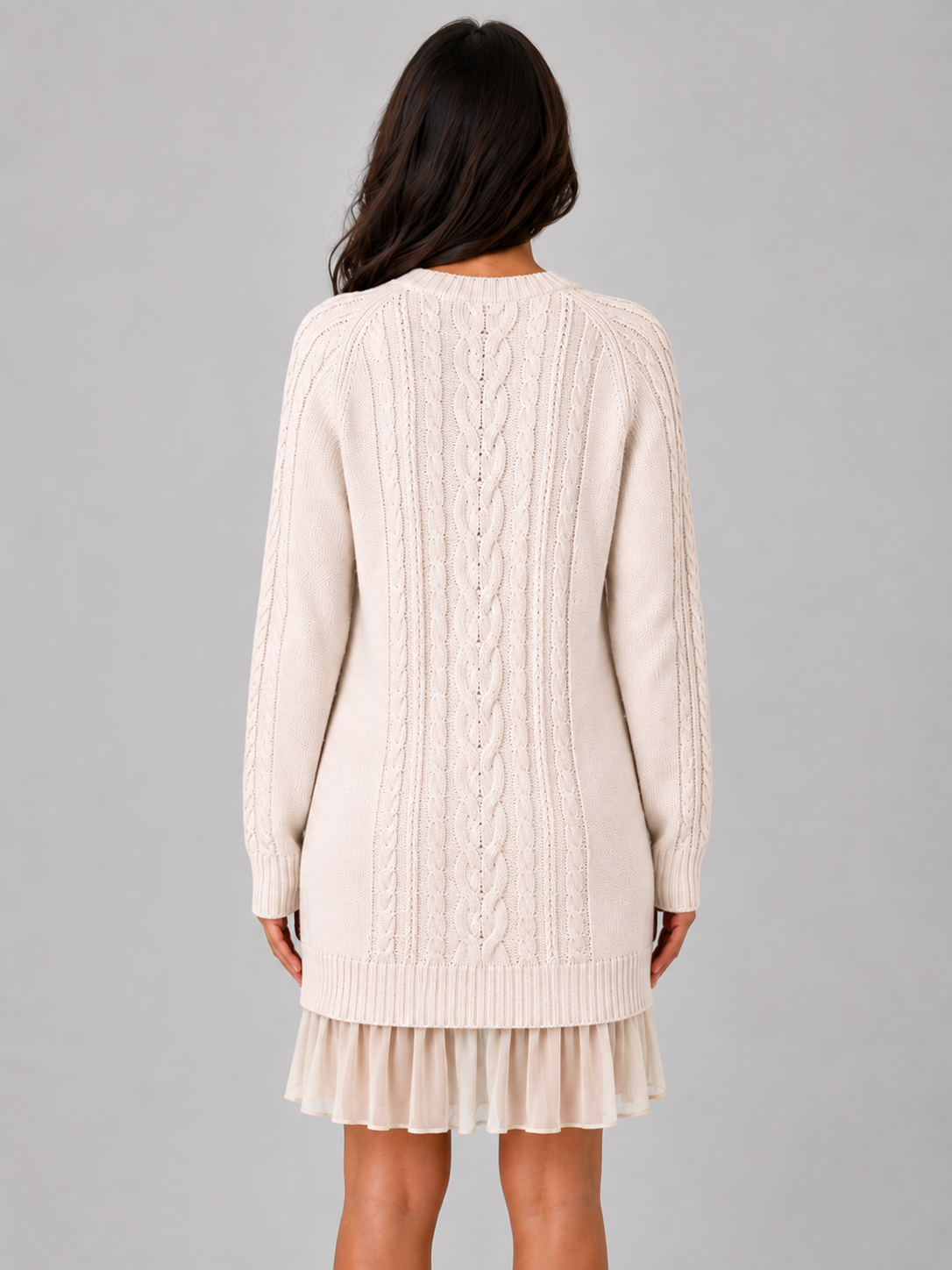 Women's cream cable knit mini dress with pleated hem, back view