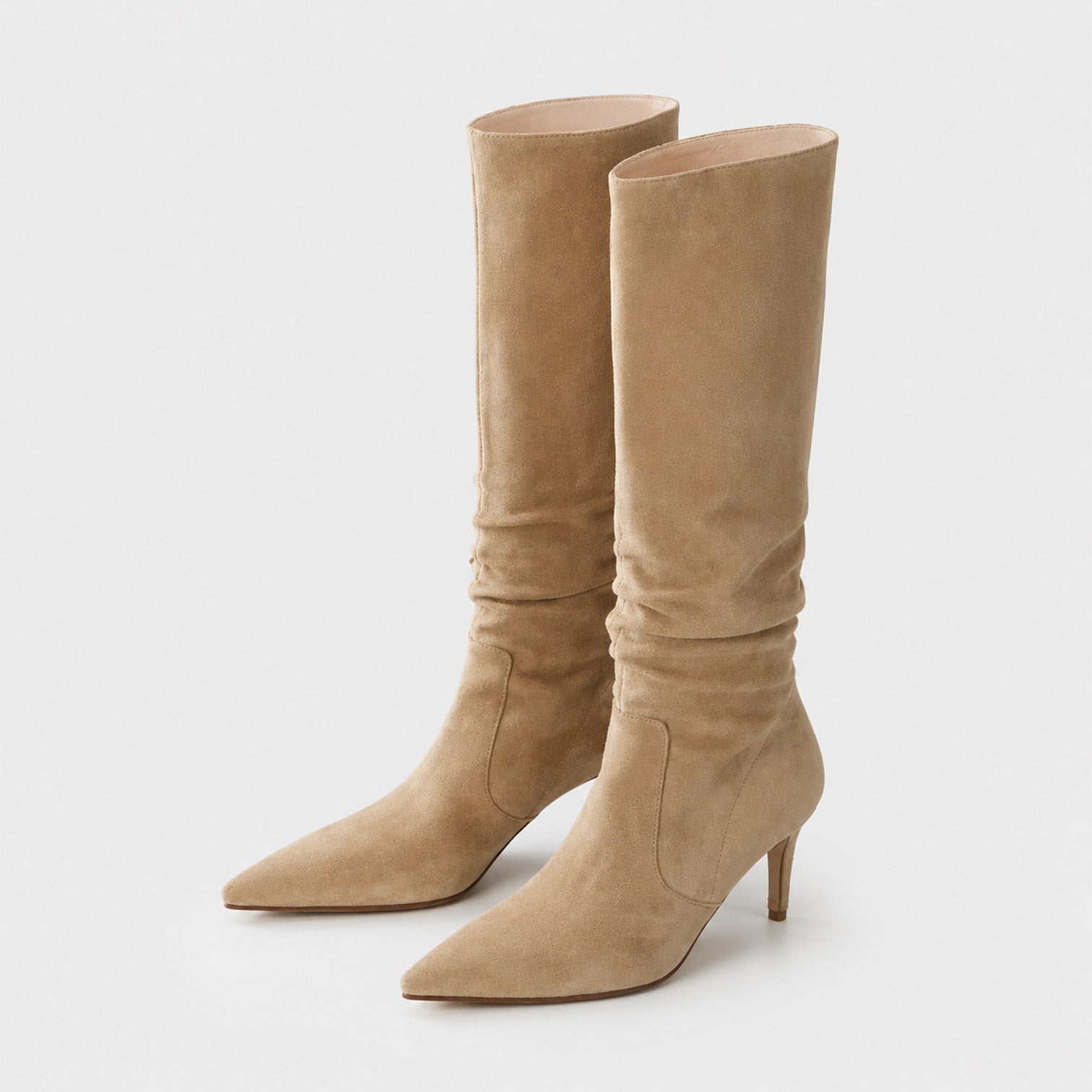 Women's Knee High Suede Boots with pointed toe stiletto heel.