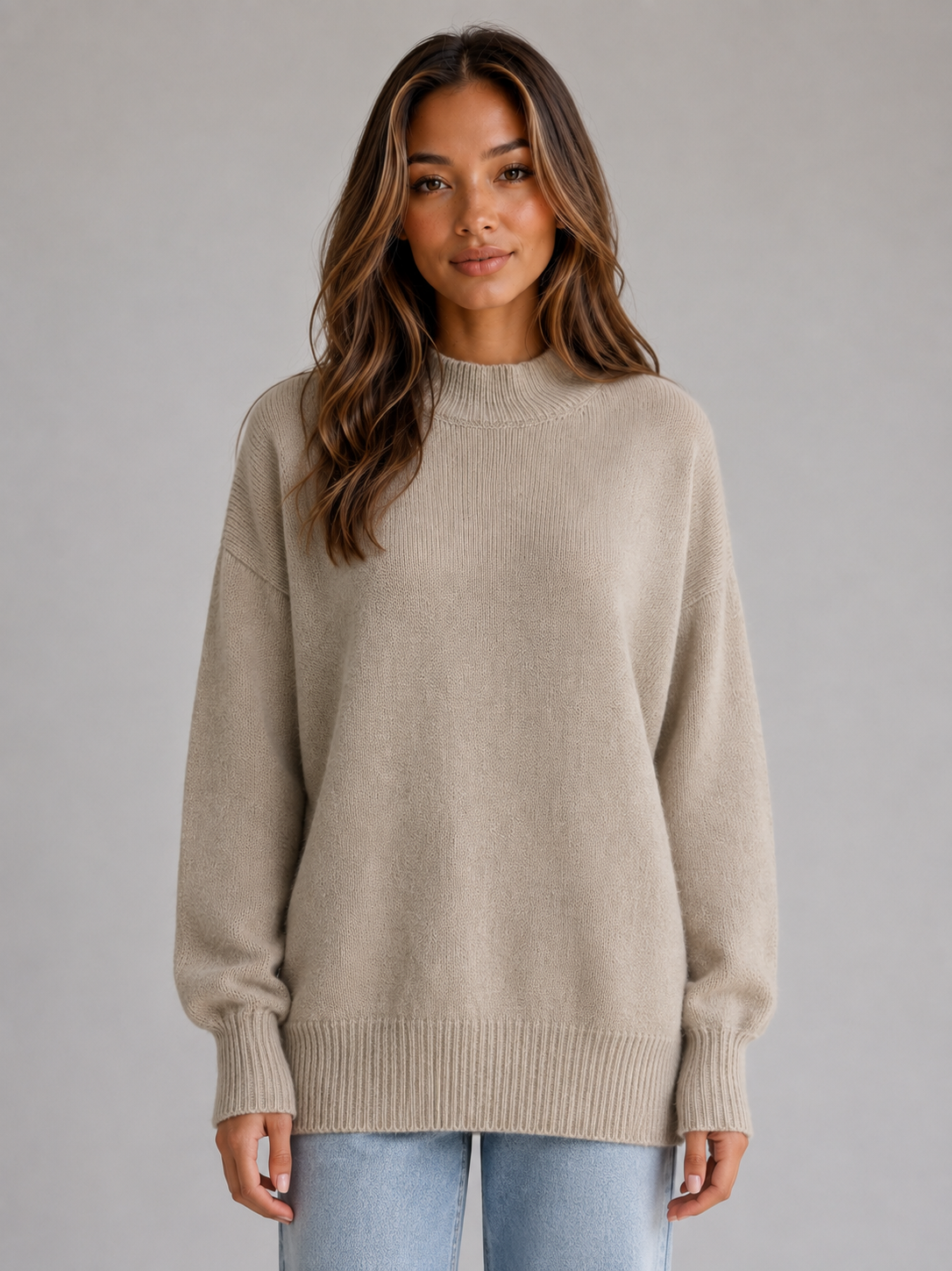 Women's Oversized Knit Jumper with high neck longline fit.